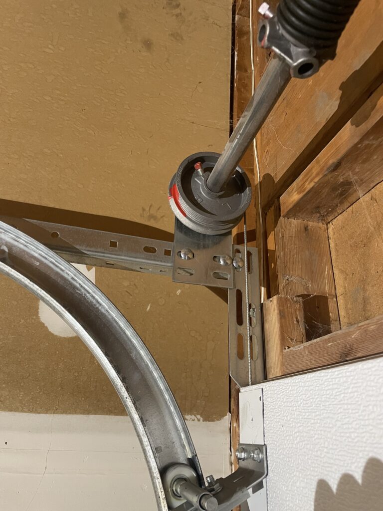 Properly functioning garage door cable after professional repair in Markham by Penguin Garage Doors.